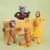 Popowe zabawki ssanie kubka lwa małpa teleskopowa dekompresja rozciągania