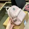 Mochila de grife para homens, mulheres, moda, bolsas escolares, casuais, de couro, marrom, letras clássicas, mini bolsa de compras de luxo