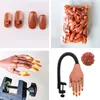 Nail Practice Display Practice Hand for Acrylic Nails Flexible Nail Practice Hands Training Movable Nail Maniquin Hand with 100 PCS Nail Tips 230619