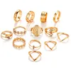 Anillos de racimo Conjunto de anillos de oro de Boho Conjunto de nudillos tallados en el dedo Accesorios de mano con estilo Joyas de aleación de metal para mujeres y niñas Sr0078 Dh20V