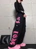 Pantaloni da donna Retro Multi Pocket Black Rose Pink Tuta stampata Pantaloni Personalità femminile Street Hip Hop Allentato Casual Danza Sport 230619