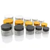 5g 10g 20g 30g 50g Travel Mini cream glass jar clear glass container with gold black silver cap Cosmetic Packaging F1221 Jncve