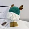 Berets Weihnachtsmütze, um ein Geschenk zu senden Winter Warme Strickwolle Weibliche Schöne Geweihe Plüsch Ohrschutzkappe Bao Kopf kalt XU138
