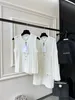 Podstawowe sukienki zwykłe projektant pasa startowego 2023 Dzianinowa sukienka dla kobiet Elegancka pusta przycisk na dzianie z długim rękawem Nowy JA4Y
