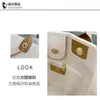 Nuova borsa da spiaggia Xiangjia Pearl Tote Fashion INS una spalla palmare Star stesso stile 5UIY Fabbrica online vendita al 70%