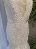 2023 Sexig sjöjungfru bröllopsklänningar underbara ärmlösa spetsar applikationer illusion kristallpärlor juvel nacke brudklänningar kyrka brud bröllop klänning riktig bild