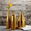 VASES HOME DECORELECTROPLATION GOLDEN CERAMIC VASE VASE NORDIC NORDIC MONEDEL LIVINGROOM DECORATIONカウンタートップ水耕栽培ドライフラワー