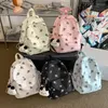 Mochilas escolares impermeables de nailon para estudiantes, mochila grande con estampado de flores para mujer, mochila para ordenador portátil para chicas adolescentes 2023