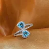 Anneaux de mariage Huitan voir coeur bleu CZ femmes pour fiançailles accessoires anniversaire amour cadeau à la mode luxe bijoux en vrac