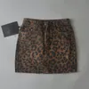 Юбки сексуальные разорванные леопардовые юбки женская мини -джинсовая юбка уличная одежда карандаш высокой талии Фалдас Мухер Мода 230621