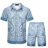 2023 Summer Fashion Mens Tracksuits Hawaii пляжные брюки набор дизайнерские рубашки печатные рубашка Man Slim подходит для доски режиссеров, рукав короткие пляжи короткие пляжи