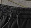 Мужские брюки дизайнер 2023 Летние новые шорты на открытом воздухе. Собственный стиль высококачественный хлопковой модный пляжный пляжный пляжный спорт 12H6