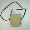 S / S18 Femmes Hommes Sac à bandoulière Designer Hype Fashion Sac à bandoulière Sac à bandoulière latéral Noir Rouge Tan Véritable Cordura Tissé Logo Centré sur le bas