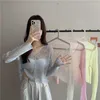 Maglieria da donna Cardigan bianco lavorato a maglia Protezione solare estiva da donna Manica lunga Coprispalle corto Coreano Vedi attraverso Kimono Top Maglione moda
