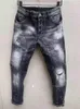 Jeans da uomo Moda uomo Casual Foro impiombato Spray verniciato Trendy MotoBiker Pantaloni in tessuto denim High Street T156