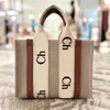 Canvas designer handbag leather beach bag versatile brown leather woody decoration sacoche classic creative letter shoulder bag tote trendy nice gifts XB039 E23