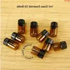 500pcs / Lot En Gros Vide 1ml Bouteille D'huile Essentielle En Verre Bouchon Noir 1 / 10OZ Mini Pot D'échantillon Ambre Petit Couvercle À Vis Rechargeable Pothigh qté Agog