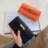 bolsos Cartera de diseñador de lujo bolso de moda para mujer bolso de color sólido versátil con patrón de lichi material de pu de alta calidad bolsillos múltiples para tarjetas de longitud media