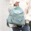 Skolväskor ryggsäck Kvinnors stora kapacitet All-Match Female Light Travel Bag Teenage Girl Nylon Tyg Rucks Bookväska