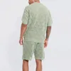 Herrspårar Spring Summer Men Fashion O Neck T Shirt och korta uppsättningar Leisure Men's Knit Clothing Solid Hollow Out Casual Two Piece Suits 230620