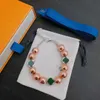 23ss kvinnor designer armband mode par rund pärla fyrklöver armband Hög kvalitet mässing material armband smycken prydnad