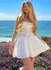 Vestidos casuales Avrilyaan 2023 encaje blanco sin espalda vestido Sexy para mujeres ahueca hacia fuera elegante vacaciones verano Mini Vestidos