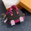 مصمم أزياء مفتاح Buckle Bag Carke -keychain مصنوعة يدويًا من الجلد المفاتيح