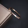 Créateur de mode vente chaude titane acier avec diamant bracelets bijoux bracelet double boucle 18k style de luxe pour les femmes