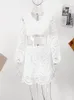 Dwuczęściowa sukienka seksowna koronkowa pusta kamizel elegancka haftowe puchanie rękawów plon top mini mini spódnica 2