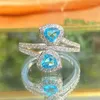 Anneaux de mariage Huitan voir coeur bleu CZ femmes pour fiançailles accessoires anniversaire amour cadeau à la mode luxe bijoux en vrac