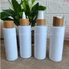 Wholesale cosmetic four colour 250ml clear/amber/frosted plastic bottles with bamboo wood lid spray /lotion/pump capgoods Vogto