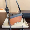 Cowhide Patent Leather Double Layer Crossbody Bag Designer Color Matchande Fashion Atmospher Hardware Lock Travel Essential Single Product