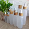 Großhandel 100 Stück leere Kunststoff-Hautpflege-Lotionbehälter, Cremedose für Spray, kosmetische Verpackungsflaschen mit Bambuskappe, Goods Mtnkn