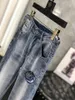 23SS Diseñador de verano Jeans Pantalones de mezclilla bordados para hombres Moda Tamaño americano 28-38 Hip Hop Pantalones con cremallera desgastada Mejor vendedor para hombres