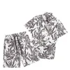Camicie firmate di LUSSO Camicie da uomo Camicie da spiaggia con stampa di lettere floreali Hawaii Camicie da uomo in seta firmate pantaloncini M-3XL