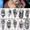 Tatouages temporaires 100 Pcs Étanche Fleur Autocollant De Tatouage En Gros Serpent Rose Flash Loup Lion Body Art Bras Faux Sexy Femmes Manches 230621