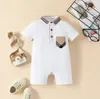 Baby Boys Girls Brand Rompers Summer Noworodowe Kuche z krótkim rękawem z dekoracją kieszonkową Krążę Kołnierza Pllika