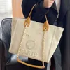 Kvinnors lyxhanddukstrandsäck på handväskor klassiska stora ryggsäckar kapacitet små kedjepaket stora crossbody ur75 fabriksuttag 55% rabatt försäljning