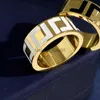 Tillverkad i Italien designer f ring extravagant emalj ihålig guld silver rose rostfritt stål bokstav ringer svarta vita kvinnor män bröllop smycken lady present 6 7 8 9