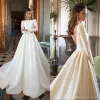 Abiti semplici Nuovissimo scollo a barca maniche lunghe volant senza schienale Abiti da sposa in raso Abito da sposa vintage realizzato su misura