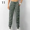 STETHANT ANTARY TAMS SHINGSING RONG SPORT JOGGERS Женщины быстро сухой спортивный тренажерный зал с двумя боковыми карманами упражнения