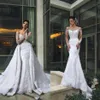 Sexig av axel långa ärmar spetsar sjöjungfru bröllopsklänningar med avtagbart tåg lyxapplikationer pärlor dubai arabiska brudklänningar1740
