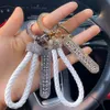 Hip Hop Crystal Anti-Lost Luxury Leather Keychain Kvinnor Män Buckle Car Key Ring Chain Holder Telefonnummer TAG KEYFOB JEYKTER