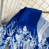 Freizeitkleider 2023 Frühling Herbst Retro-Druck Blaue knielange Kleider Damen V-Ausschnitt Laternenärmel Elastische Taille Schlankes Urlaubs-Strandkleid