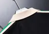 Men Polos de golfe casual 2023 Logotipo de peito de pescoço de verão impressão de manga curta Camisas de ombro listradas coloridas