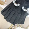 Zweiteiliger Kleid Winter schwarzer Tweed Crop Top Set Women Bowknot Short Jacket + High Taille Mini Faltenrock Anzüge Streetwear 2 -Stück Sets 2023