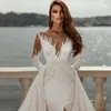 Robes De Mariée Sirène De Luxe Avant Perles Perlées Satin Perlé Manches Longues Robes De Mariée Avec Train Détachable Sheer Neck Moderne Arabe Dubaï Robe De Novia