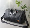 High Quality Unisex Black Travel Bag Badge Letter Mens Travel Bag Luggage Bag Genuine Leather Duffel Bags Women Fitness Yoga Bag Totes Zipper Shoulder Bags Handbags