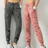 STETHANT ANTARY TAMS SHINGSING RONG SPORT JOGGERS Женщины быстро сухой спортивный тренажерный зал с двумя боковыми карманами упражнения