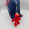 Partihandel plysch docka elmo docka söt kaka monster hänge gul stor fågel leksak söt ryggsäck hänge